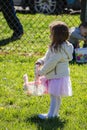 Young Girl at an Easter Egg Hunt